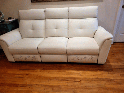 8501 White sofa w/ manual recliners at the customer's house